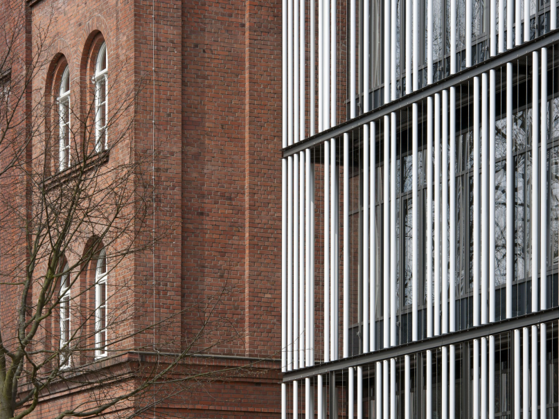 plush74 modern building with brick facade 2