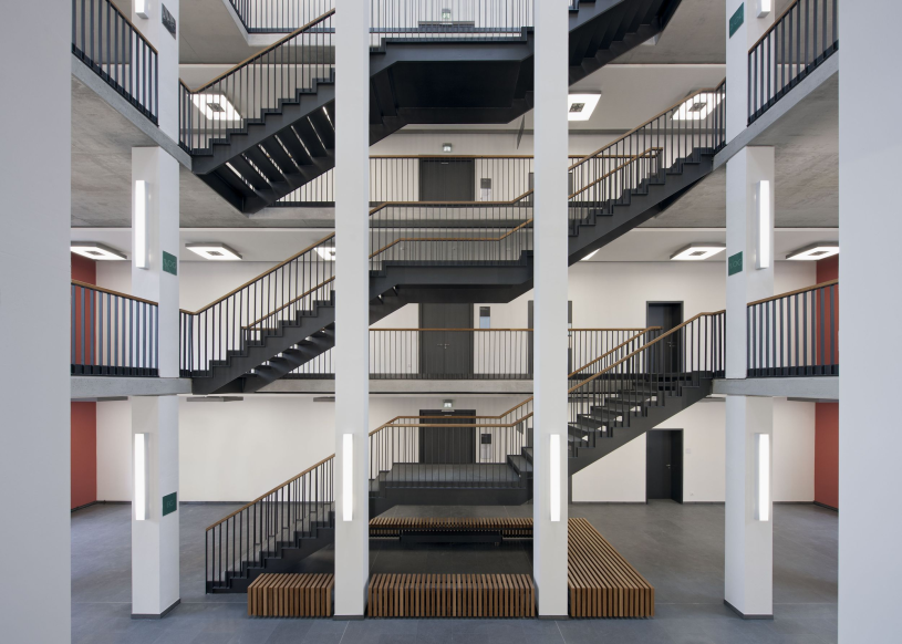 plush74 modern building with brick facade 4